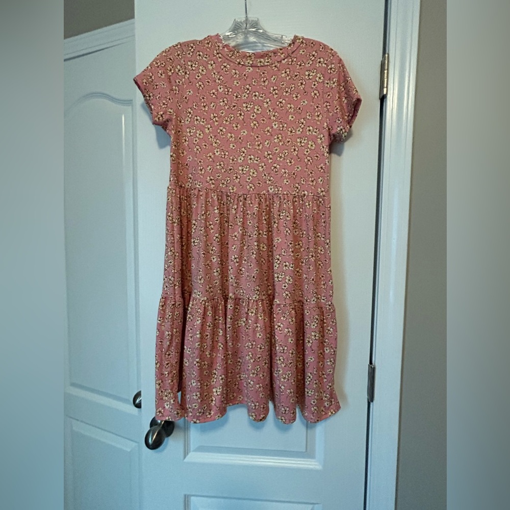 Jessica Simpson dress with peach-colored and yellow tones.